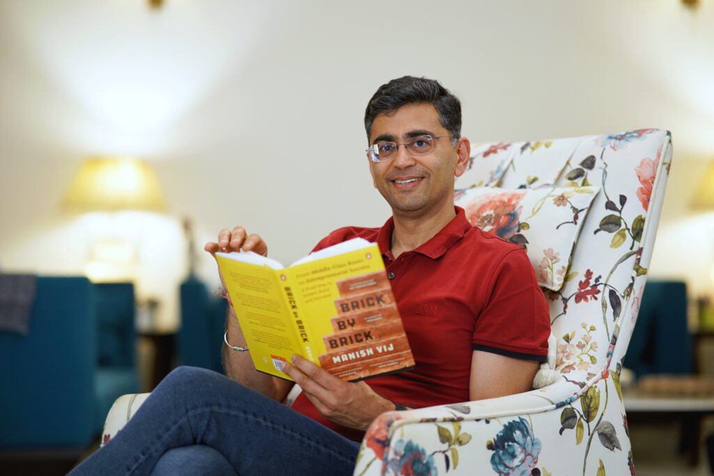 Image of Manish Vij, author of Brick by Brick Book, in the Author section, sharing his success story.